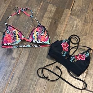 Two xhilaration size M bikini tops.